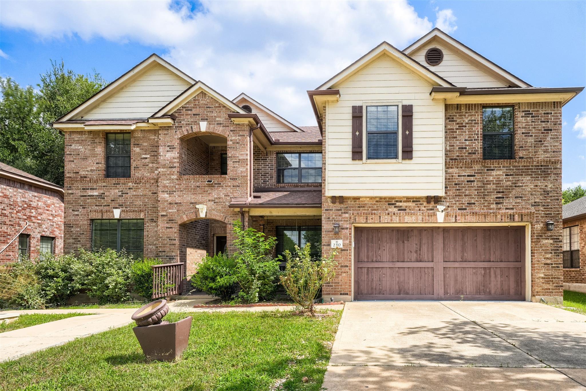 Classic brick and siding architecture defines thi
