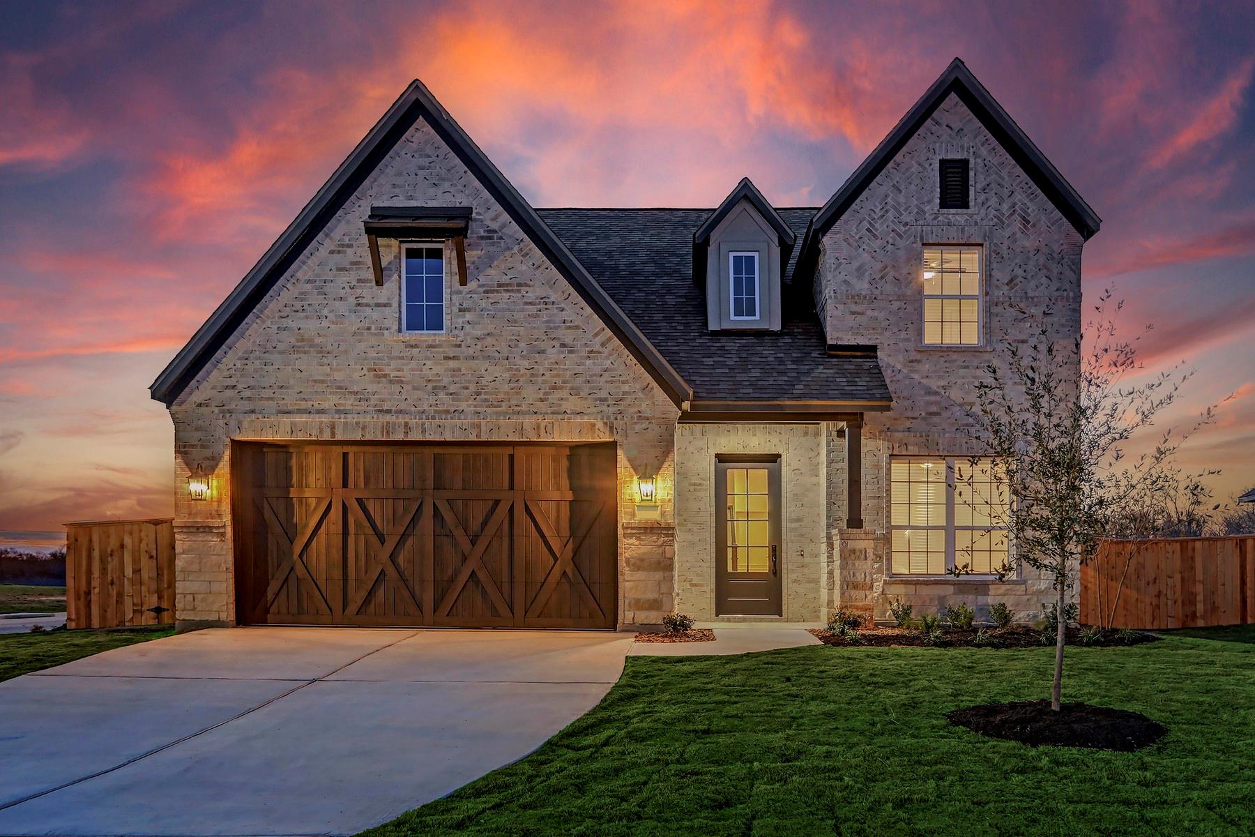 Gable rooflines and brick masonry create a striki