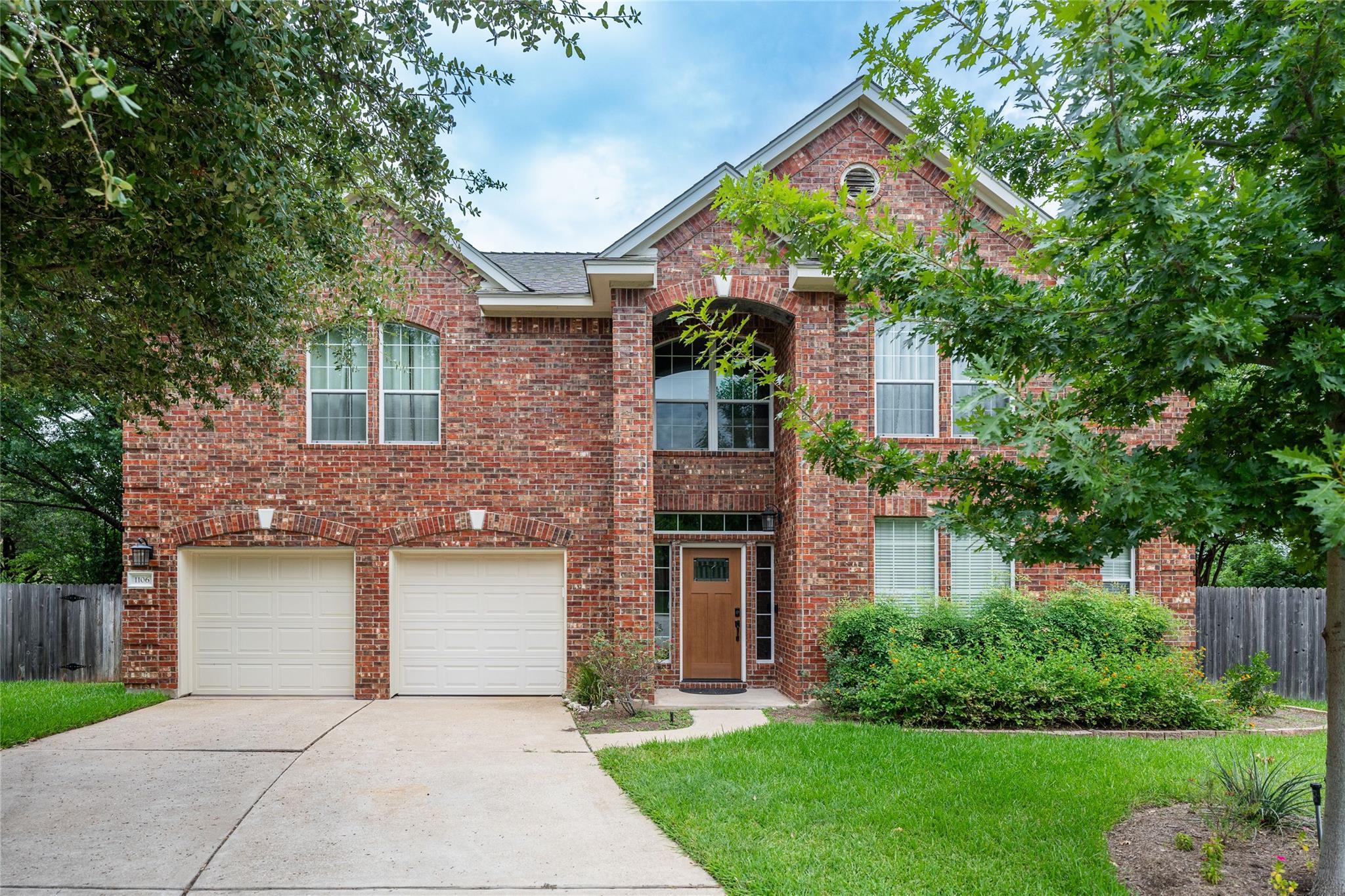 Gable rooflines and classic brickwork define this