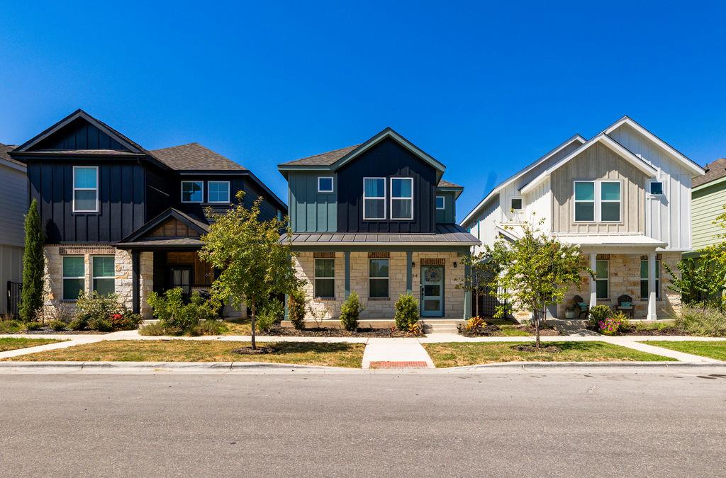 Charming modern exteriors feature mixed stone and