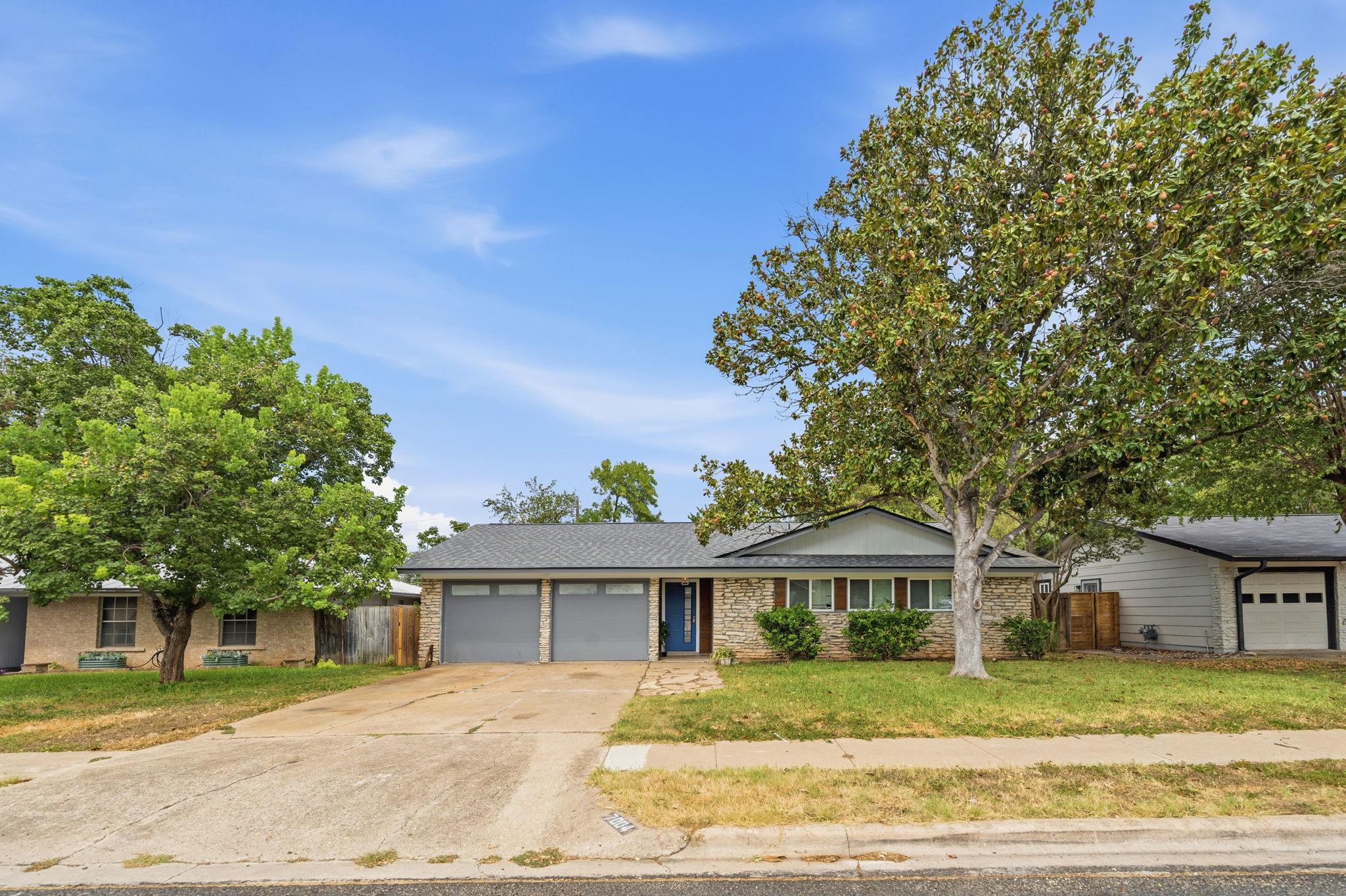 Listing photo 1 of 7004  Whispering Oaks Dr