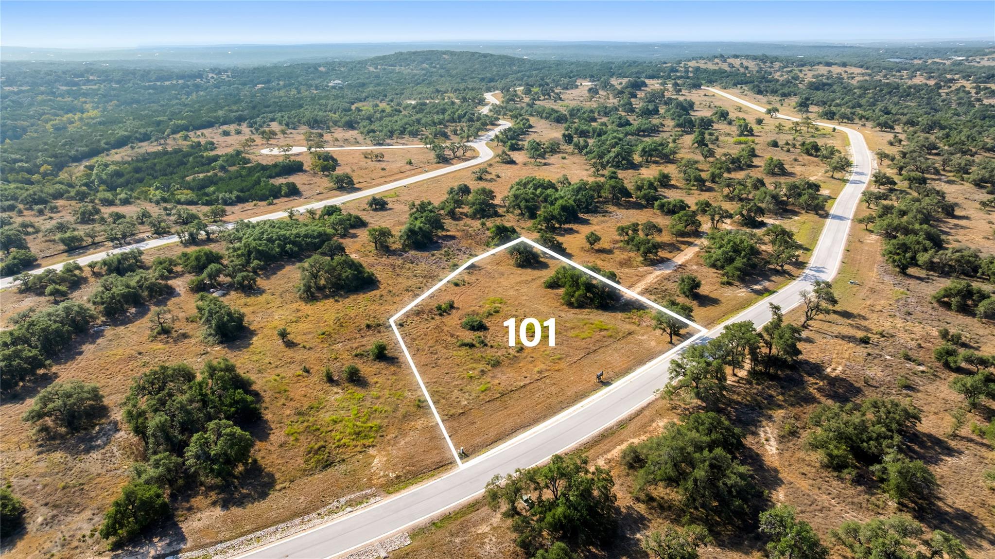 A spacious home site stands ready for development