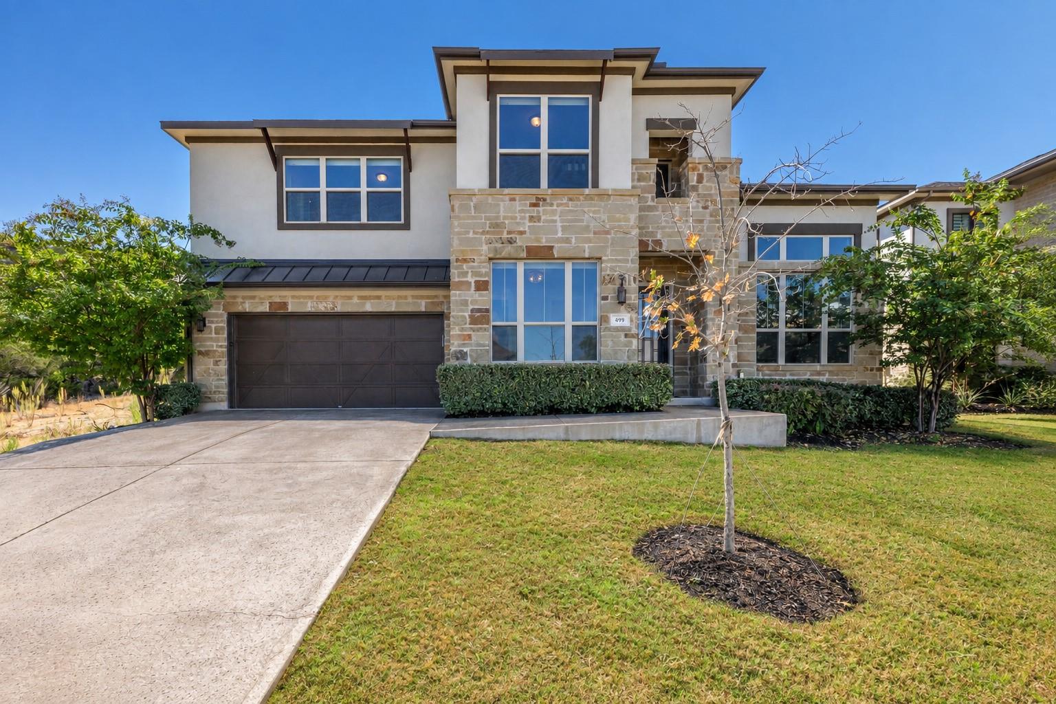 Stone and stucco exterior details complement the 