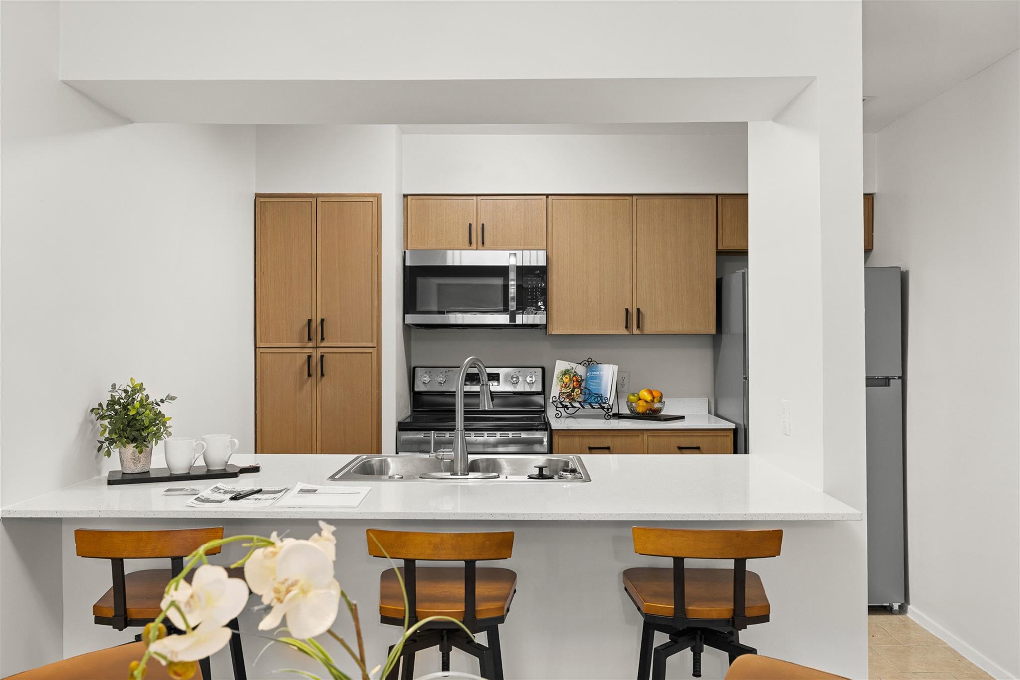 Clean lines and a functional breakfast bar define