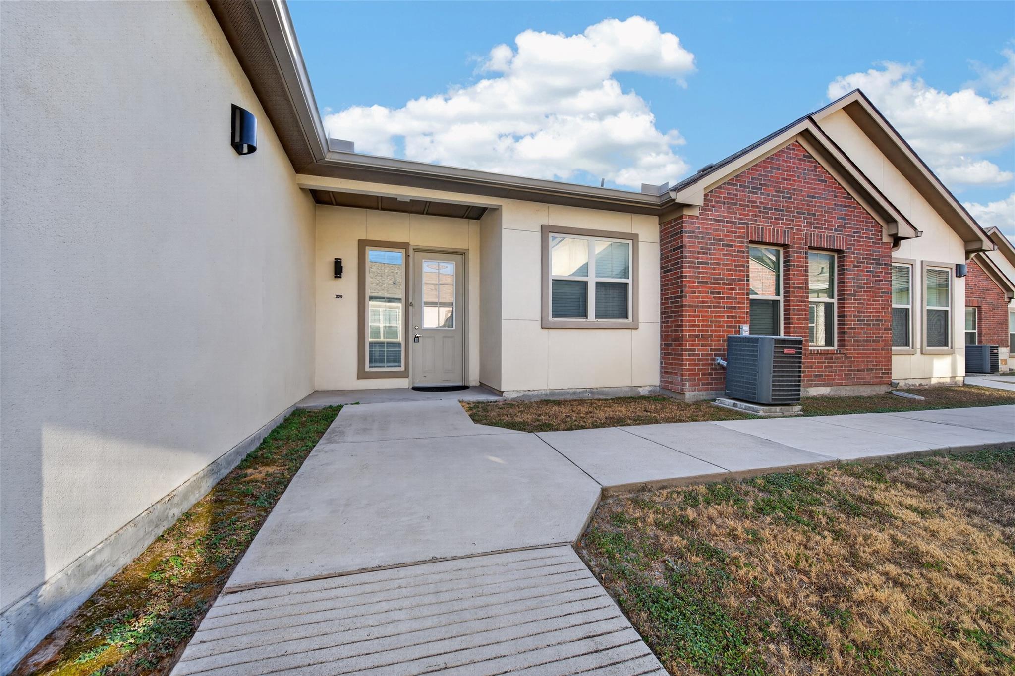 Listing photo 1 of 2400  Louis Henna Blvd  #209
