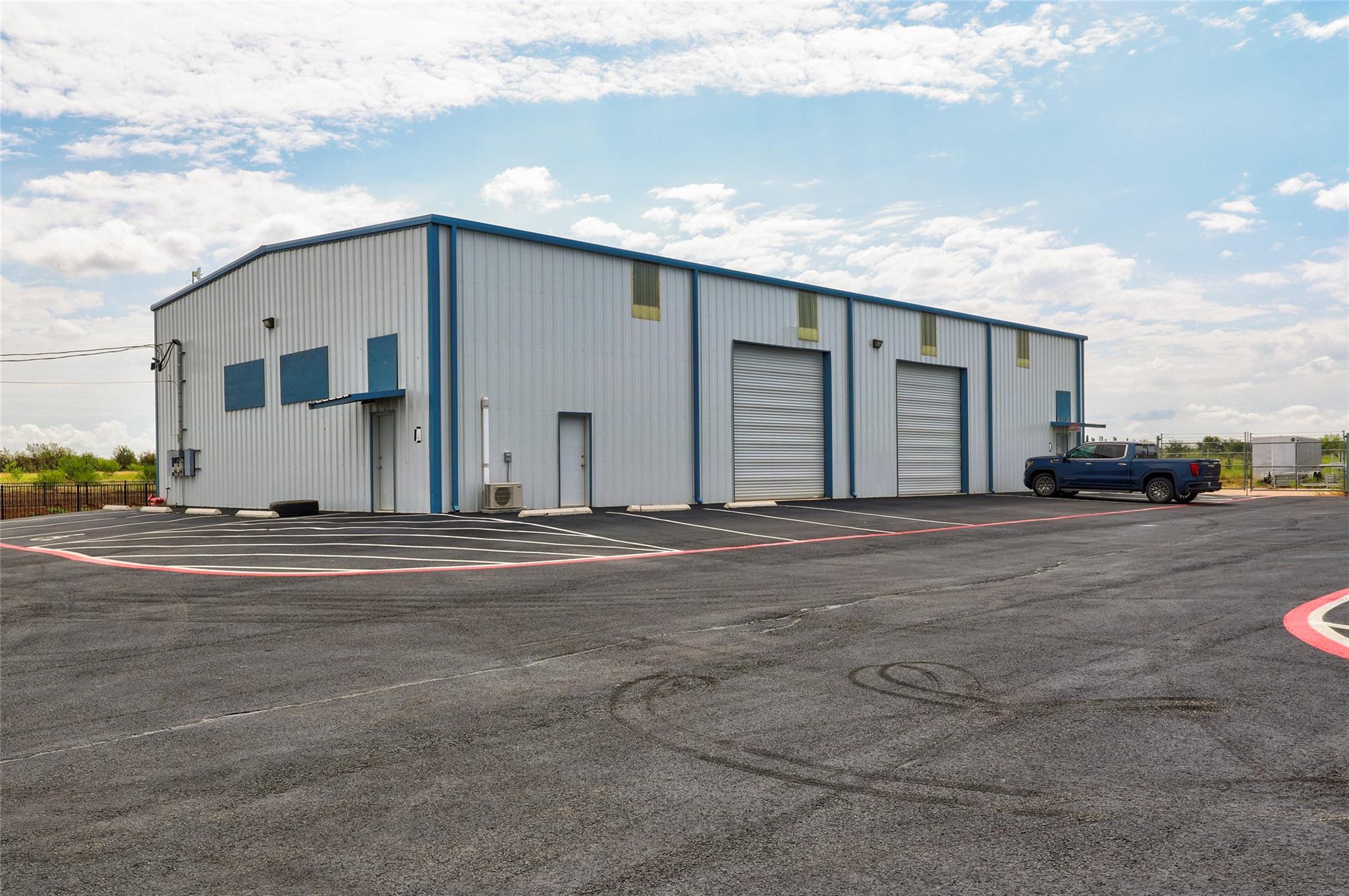 A spacious commercial metal building features mul