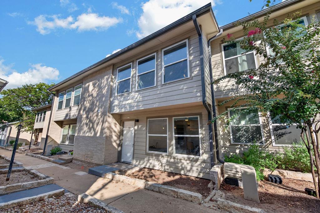 Multi-level townhouse architecture showcasing cle
