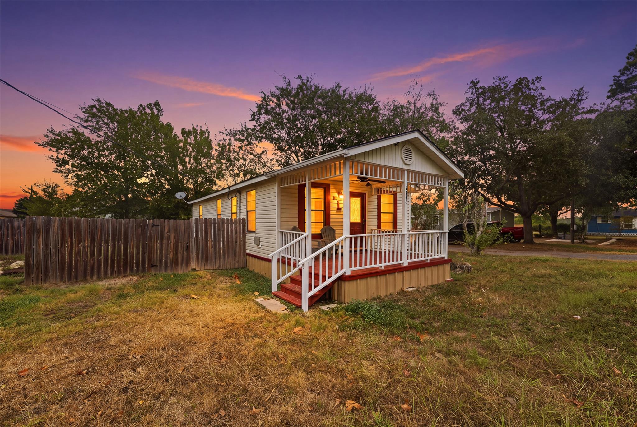 An inviting front porch welcomes visitors to this