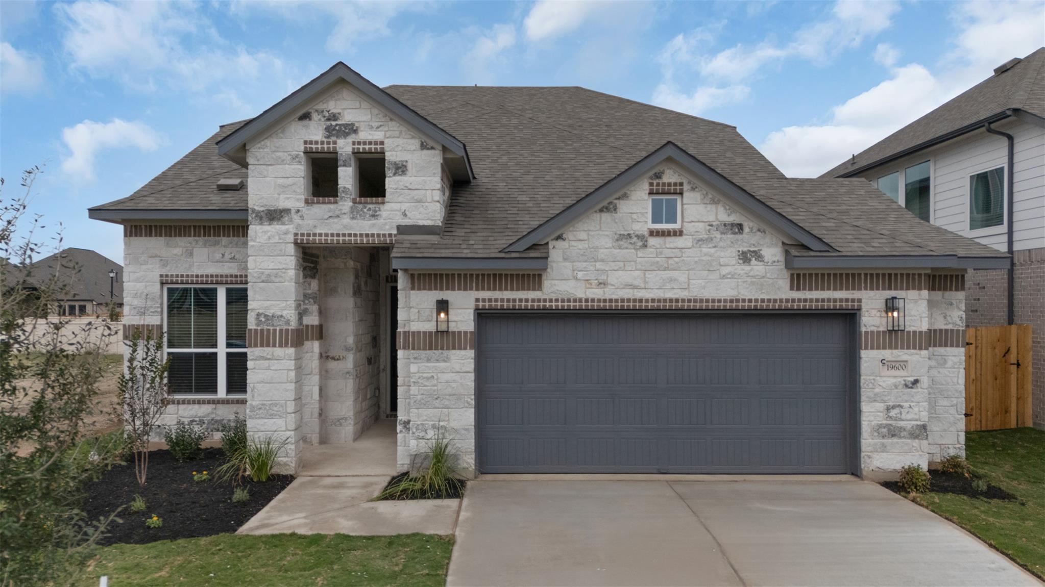 Textured light stone masonry contrasts elegantly 