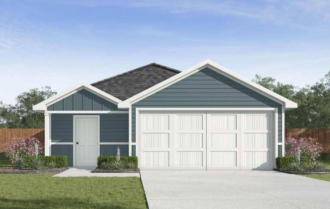 A classic concrete driveway leads to a spacious t
