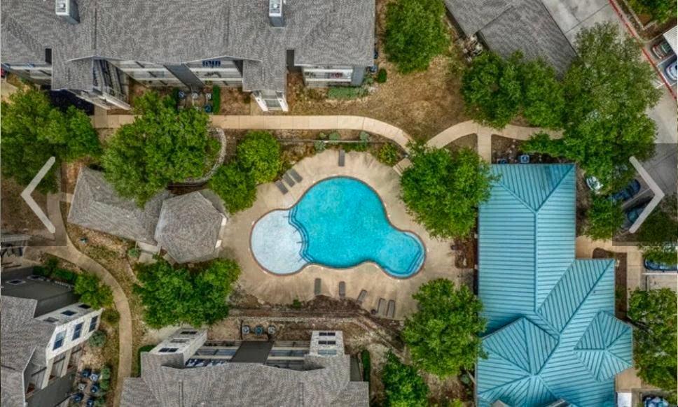 An aerial perspective showcases a sparkling commu