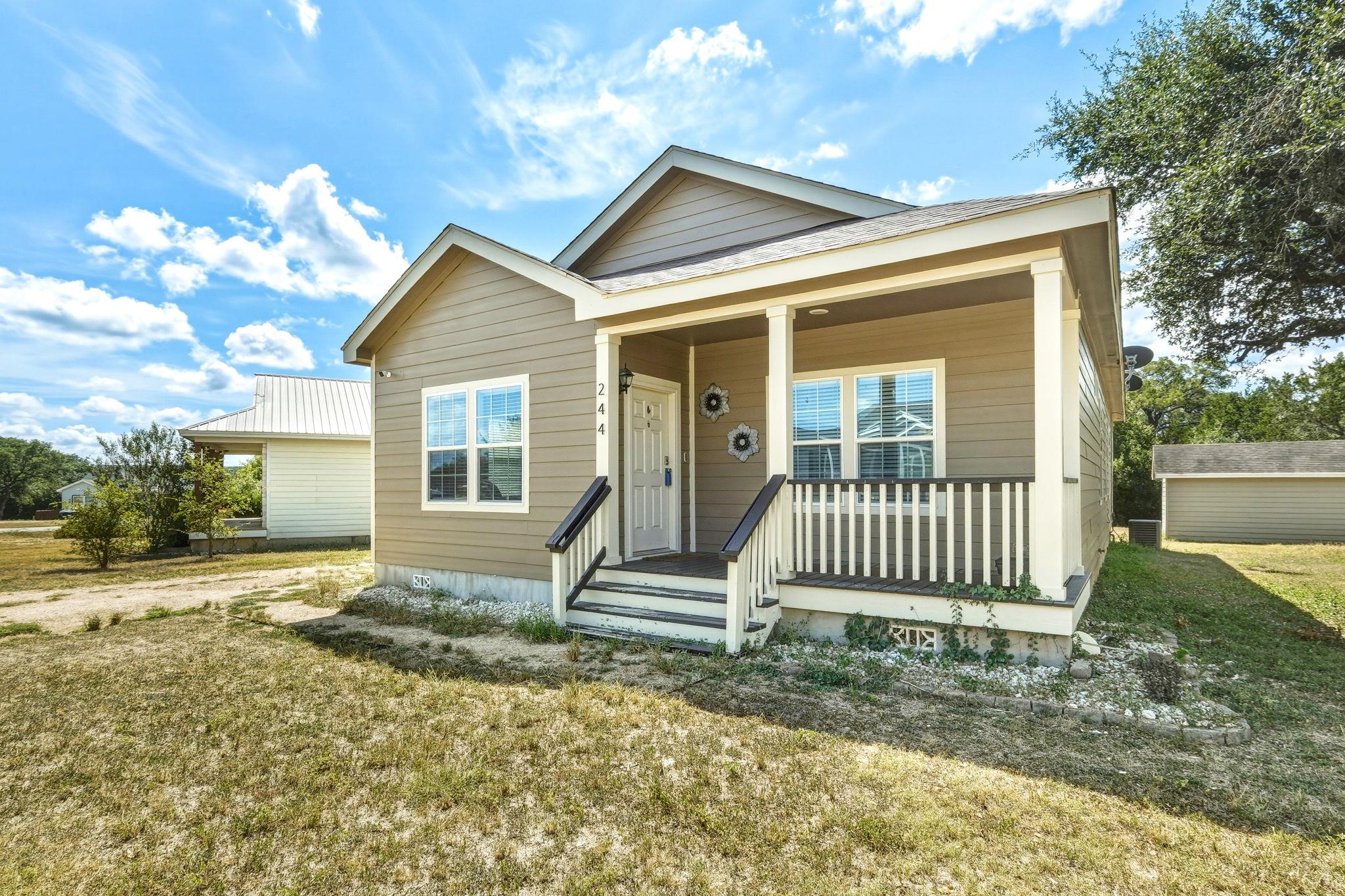Classic horizontal siding and a welcoming front p