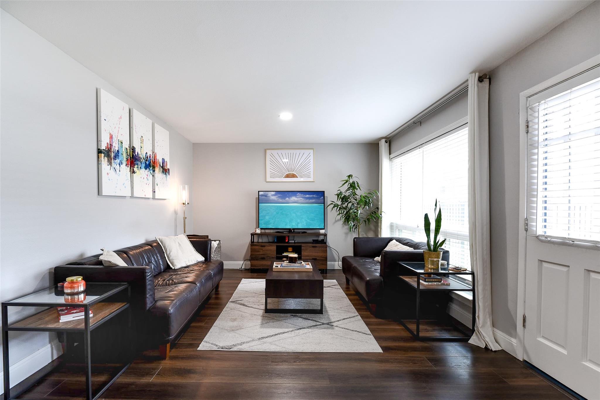 Rich wood floors lay a warm foundation for this c