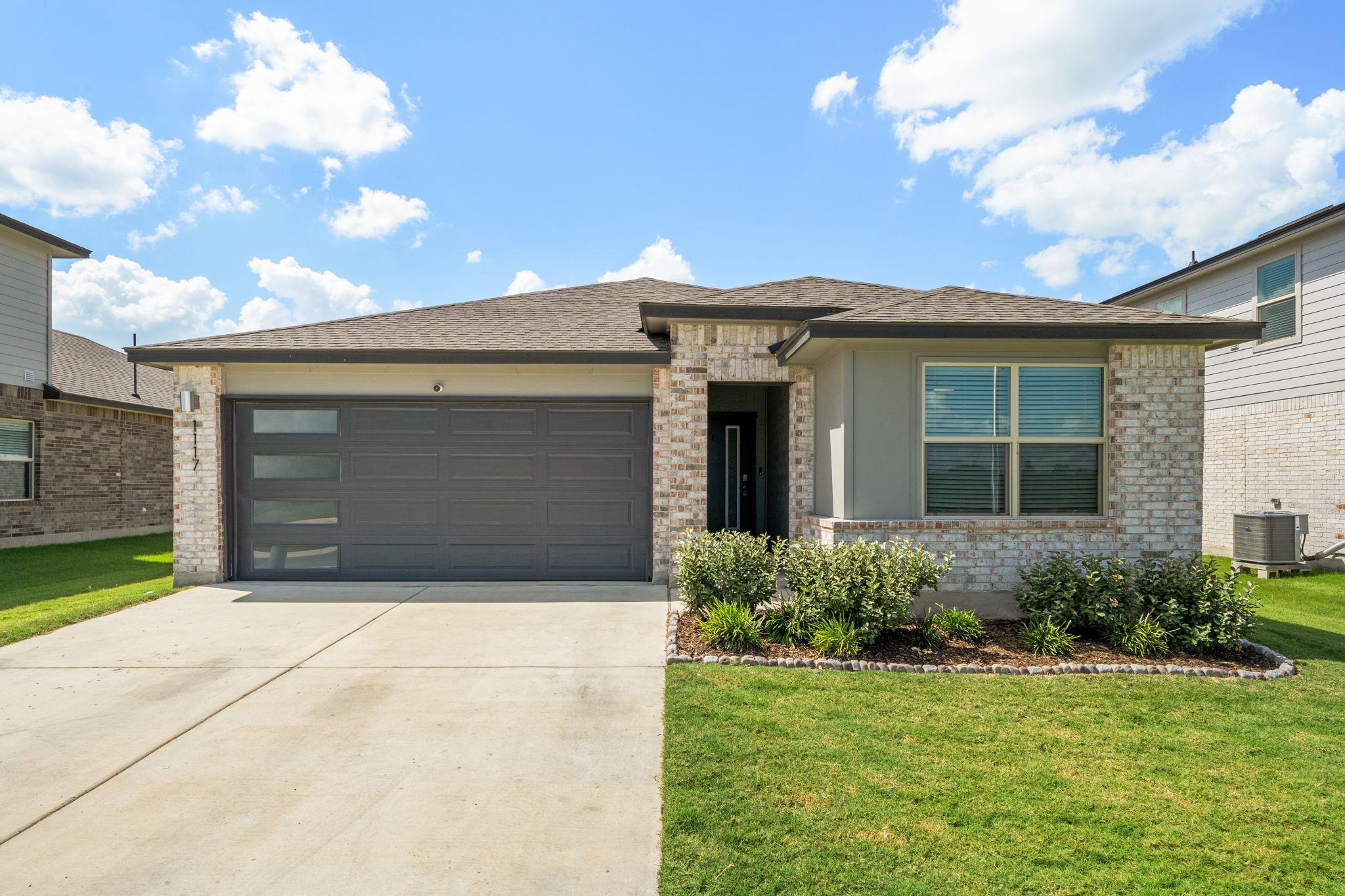 Clean architectural lines and manicured landscapi