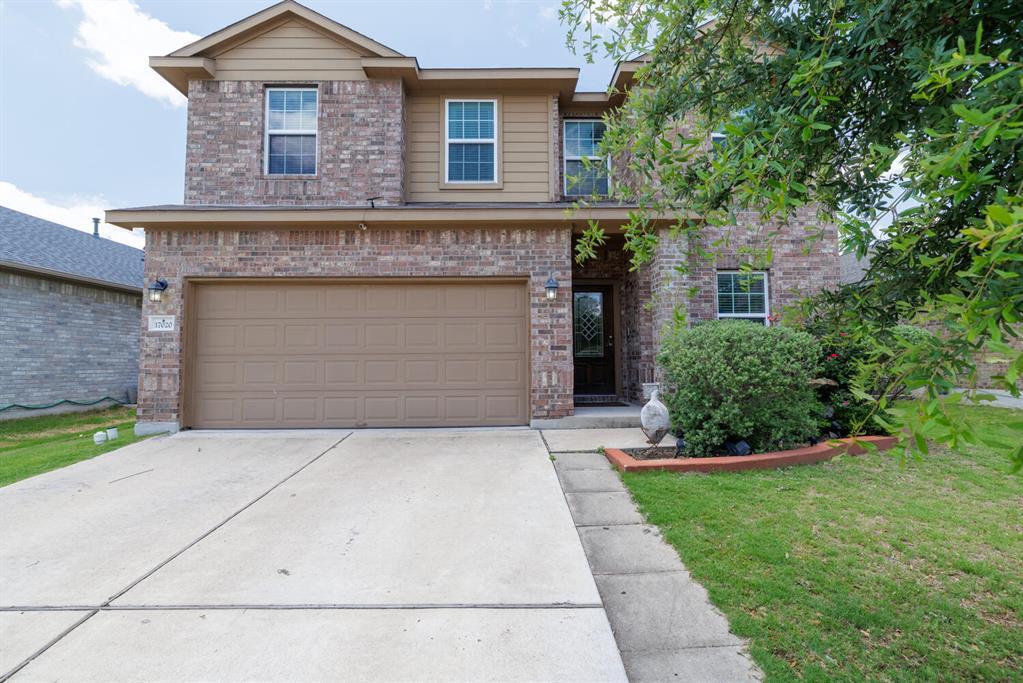 Brick and siding accents create classic curb appe