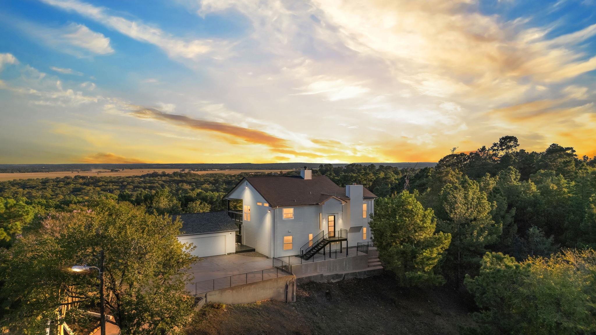An elevated hillside position anchors this contem