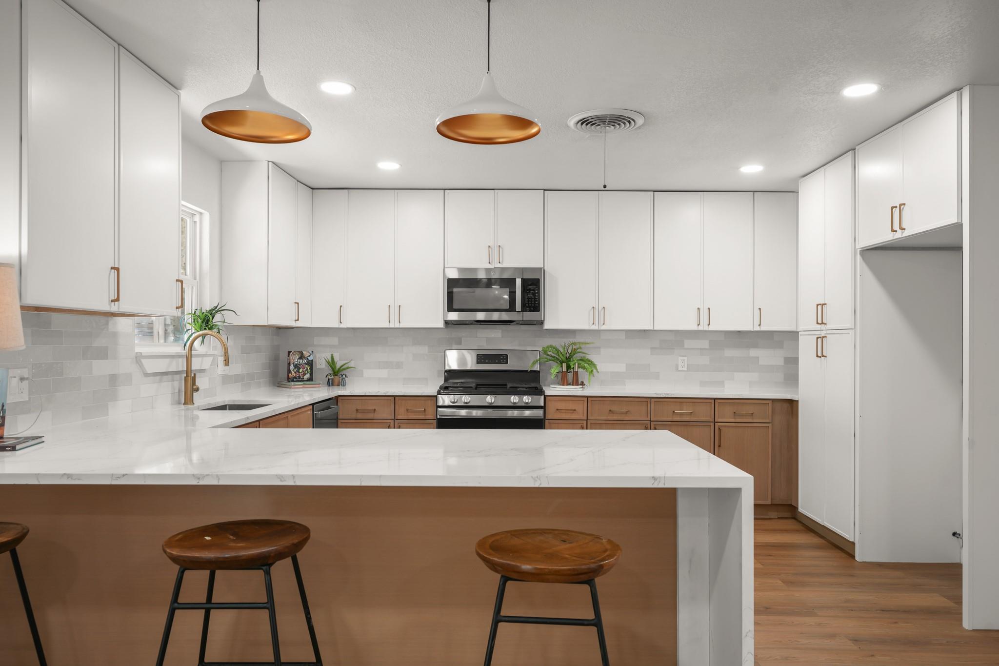 Elegant quartz countertops and custom cabinetry d