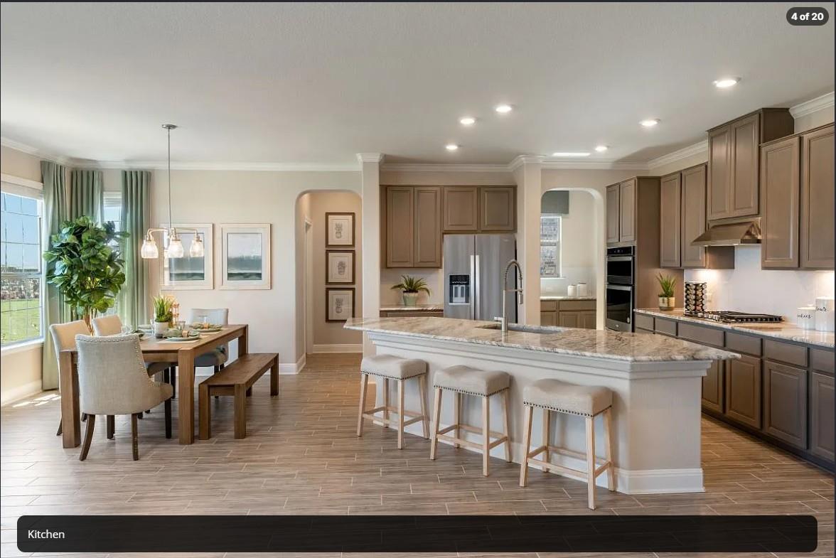 Granite countertops and an expansive central isla