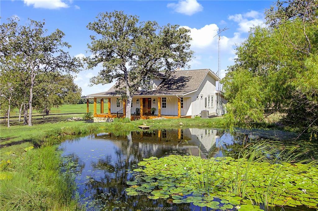 An inviting country home sits peacefully behind a