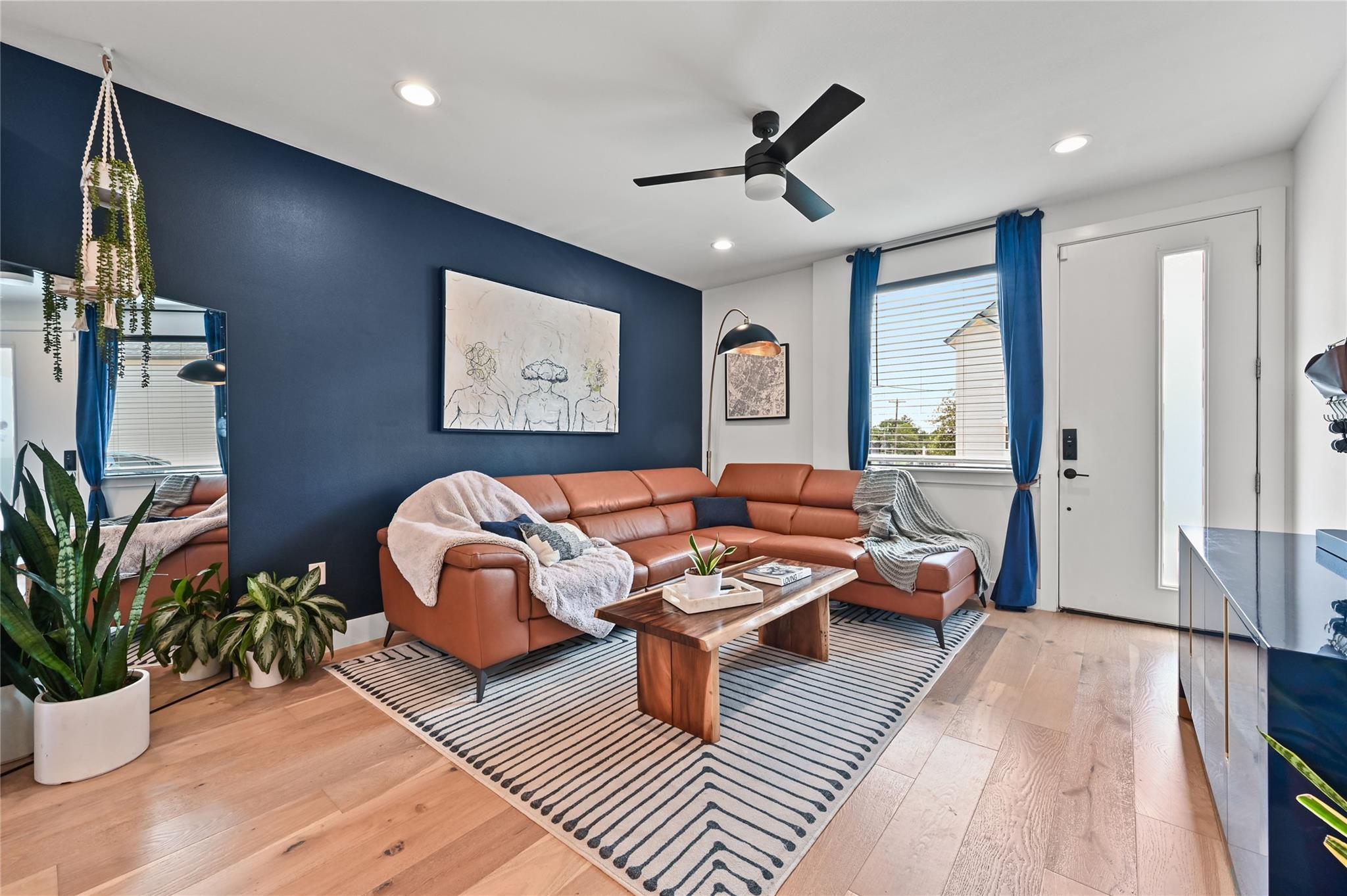 Living room with hardwood / wood-style floors, ce