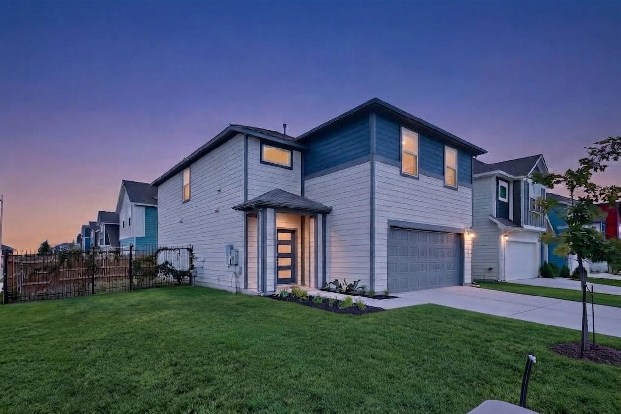 Modern multi-textured siding and clean lines defi