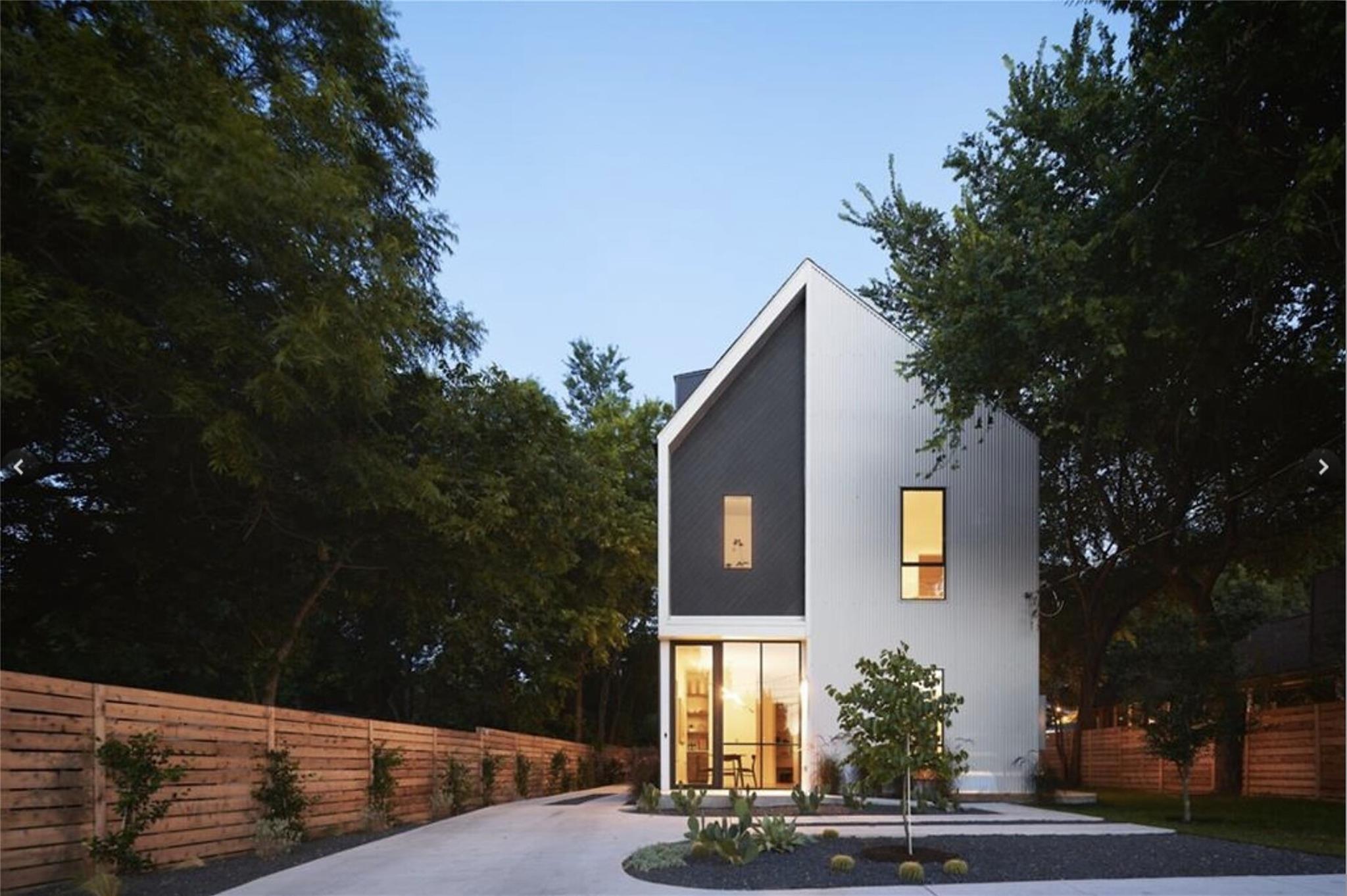 Sleek architectural lines define this modern resi