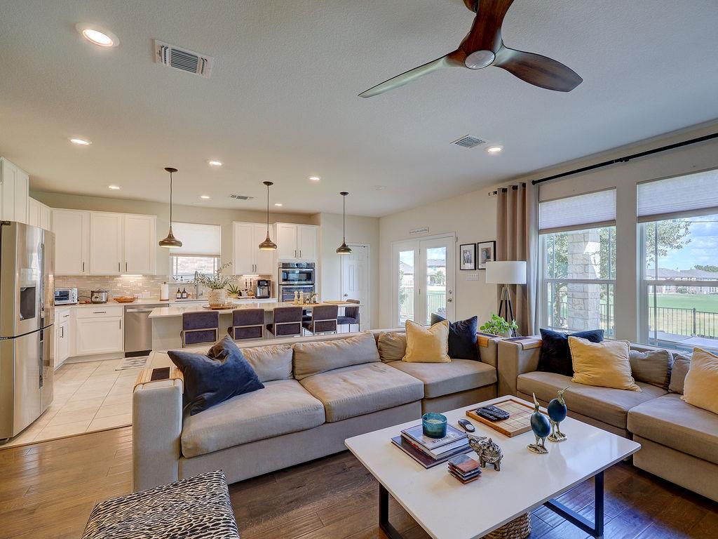 An open concept floor plan seamlessly connects th