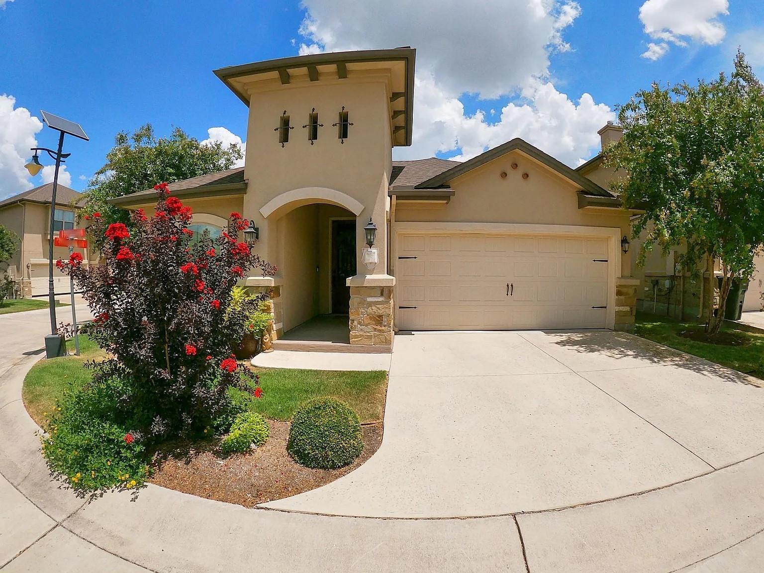 Stately stucco and stone architectural elements f