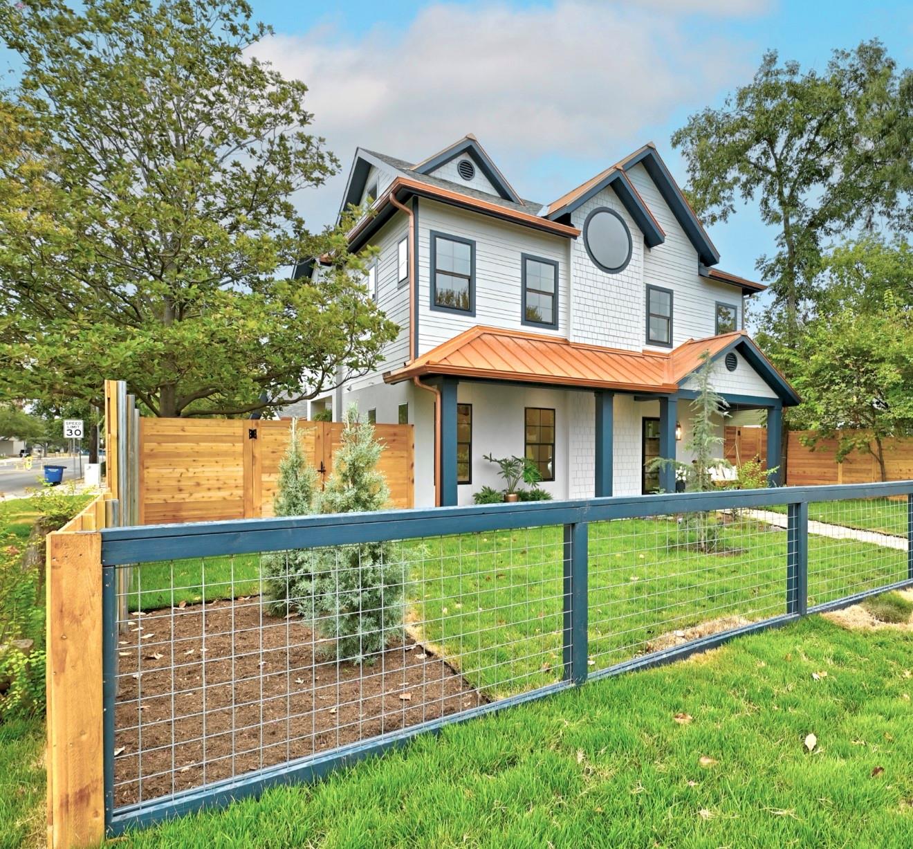Striking metal roofing accents this modern multi-