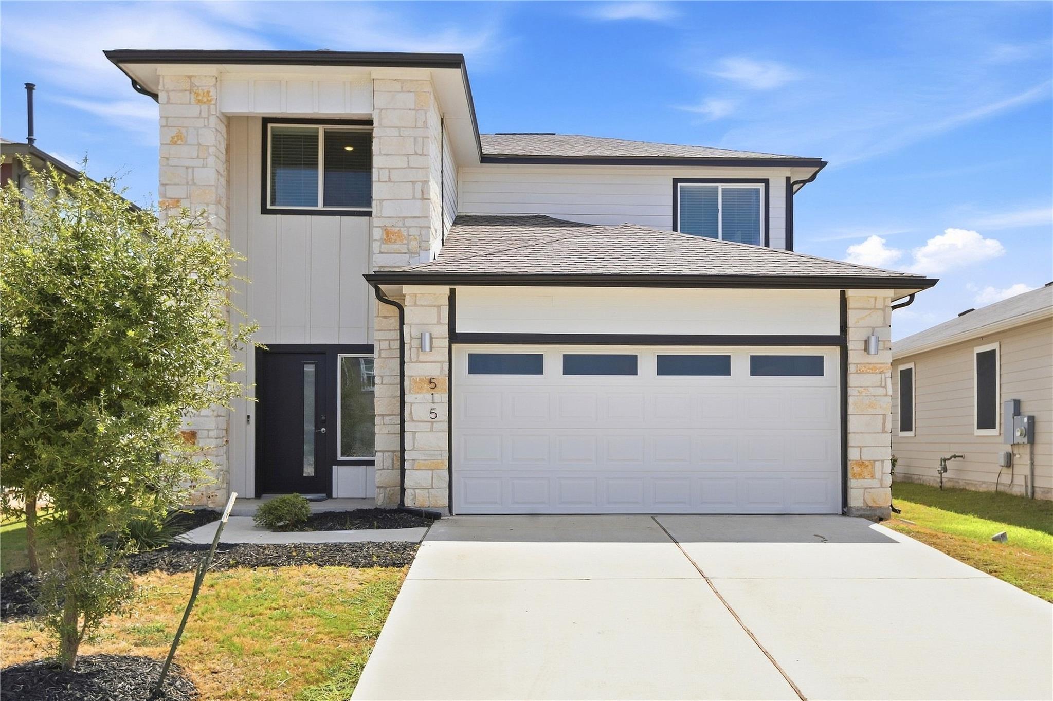 Clean architectural lines and stone accents defin