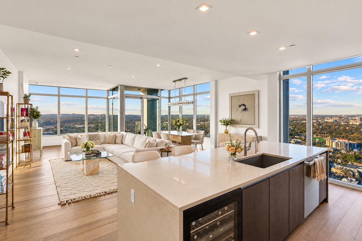 Floor-to-ceiling windows frame panoramic views ac