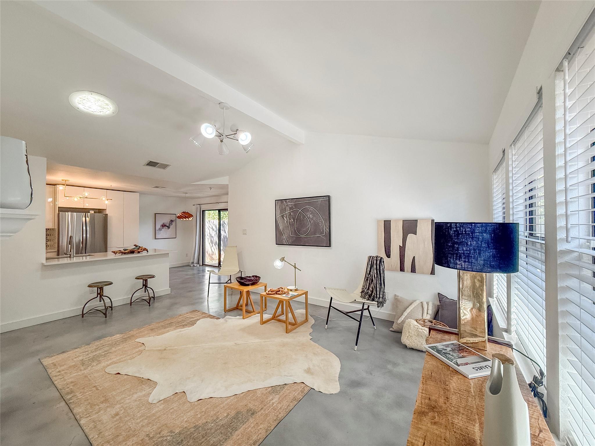 Polished concrete floors and high ceilings define