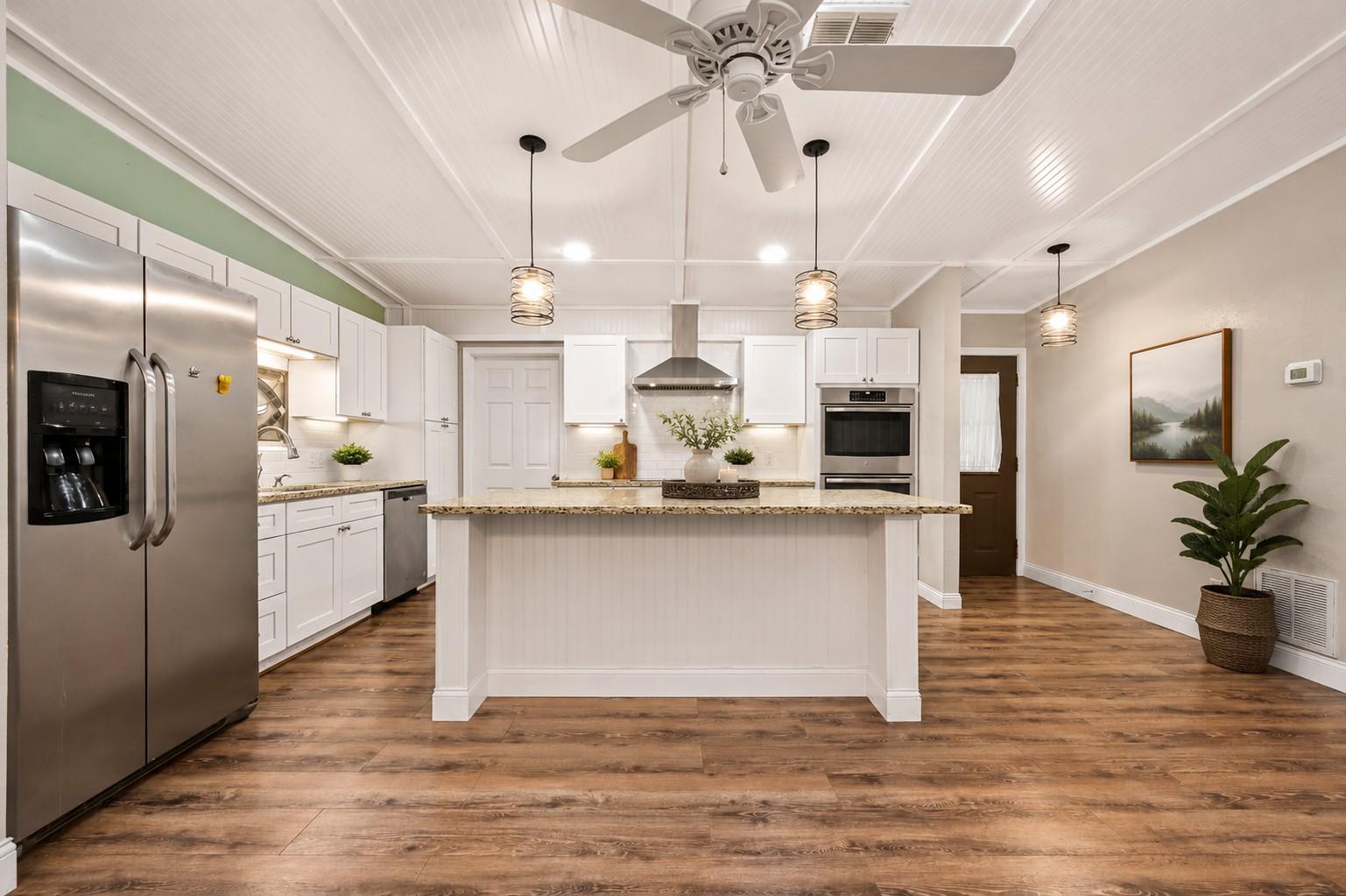 Gleaming hardwood floors and a spacious center is