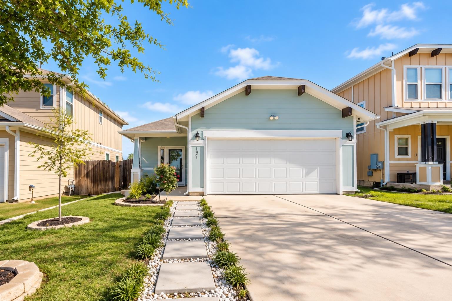 Welcoming front exterior showcases clean architec