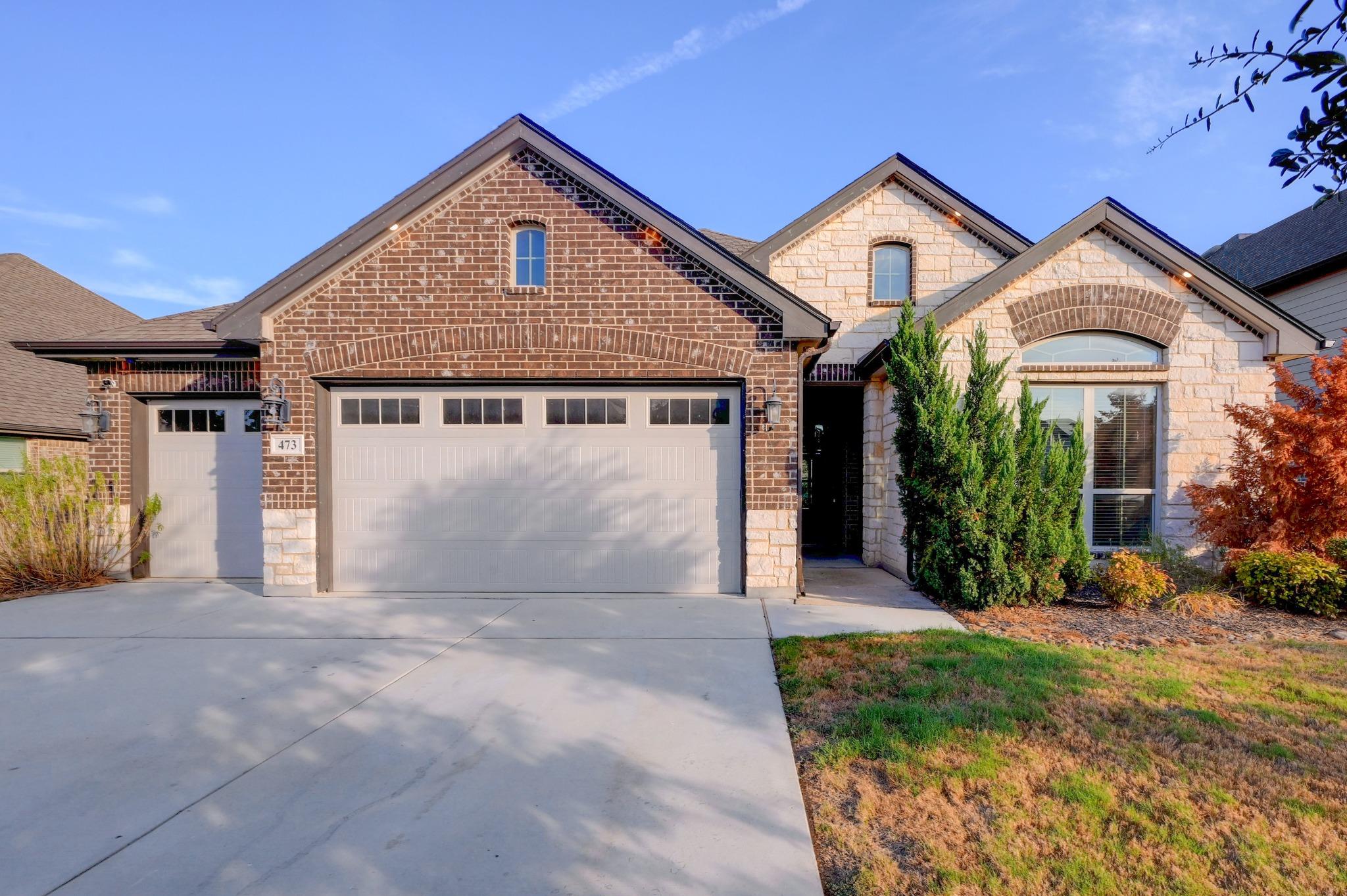 Striking brick and stone masonry defines the exte