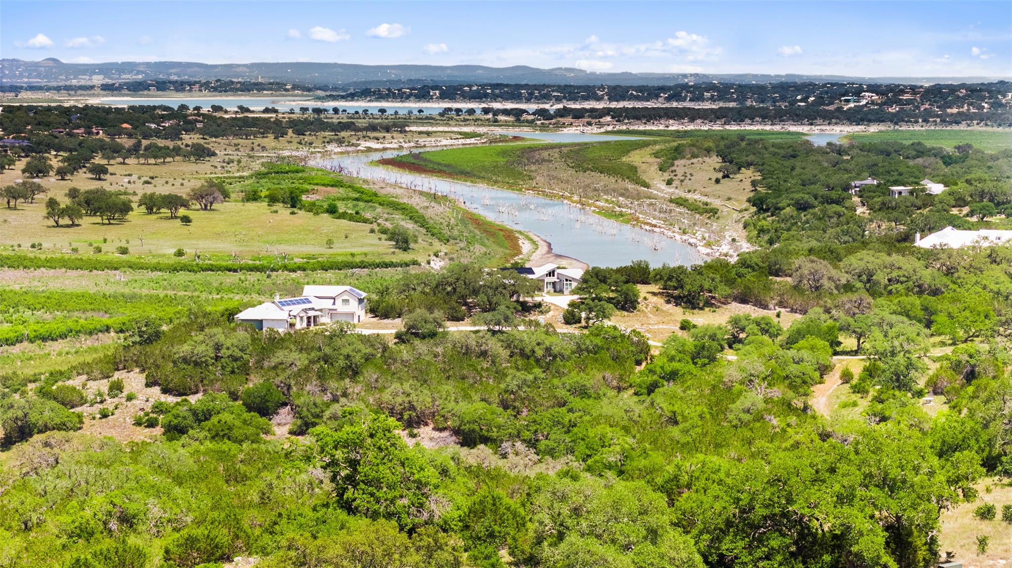 Rolling green hills surround this spectacular cou