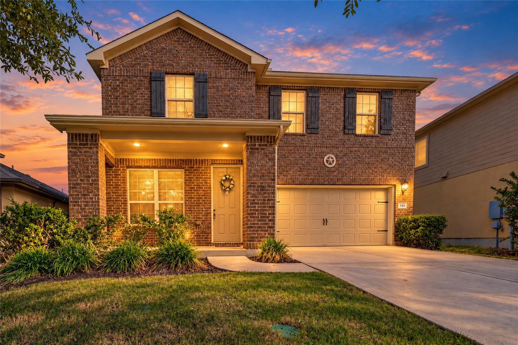 Classic brick craftsmanship defines this two-stor