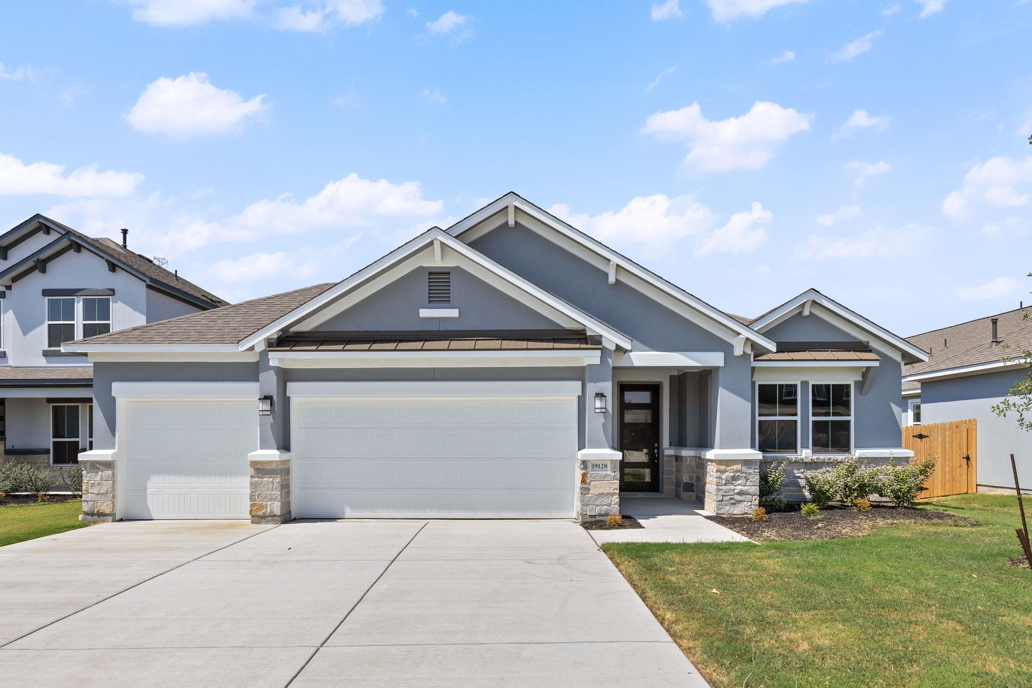 Clean lines and stone accents define this modern 