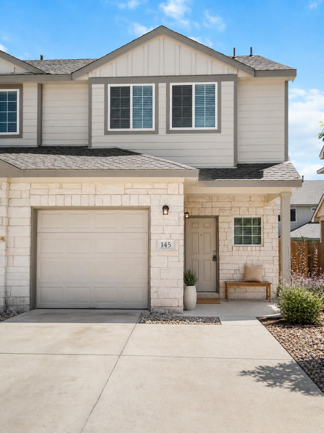Textured stone veneer and horizontal siding defin