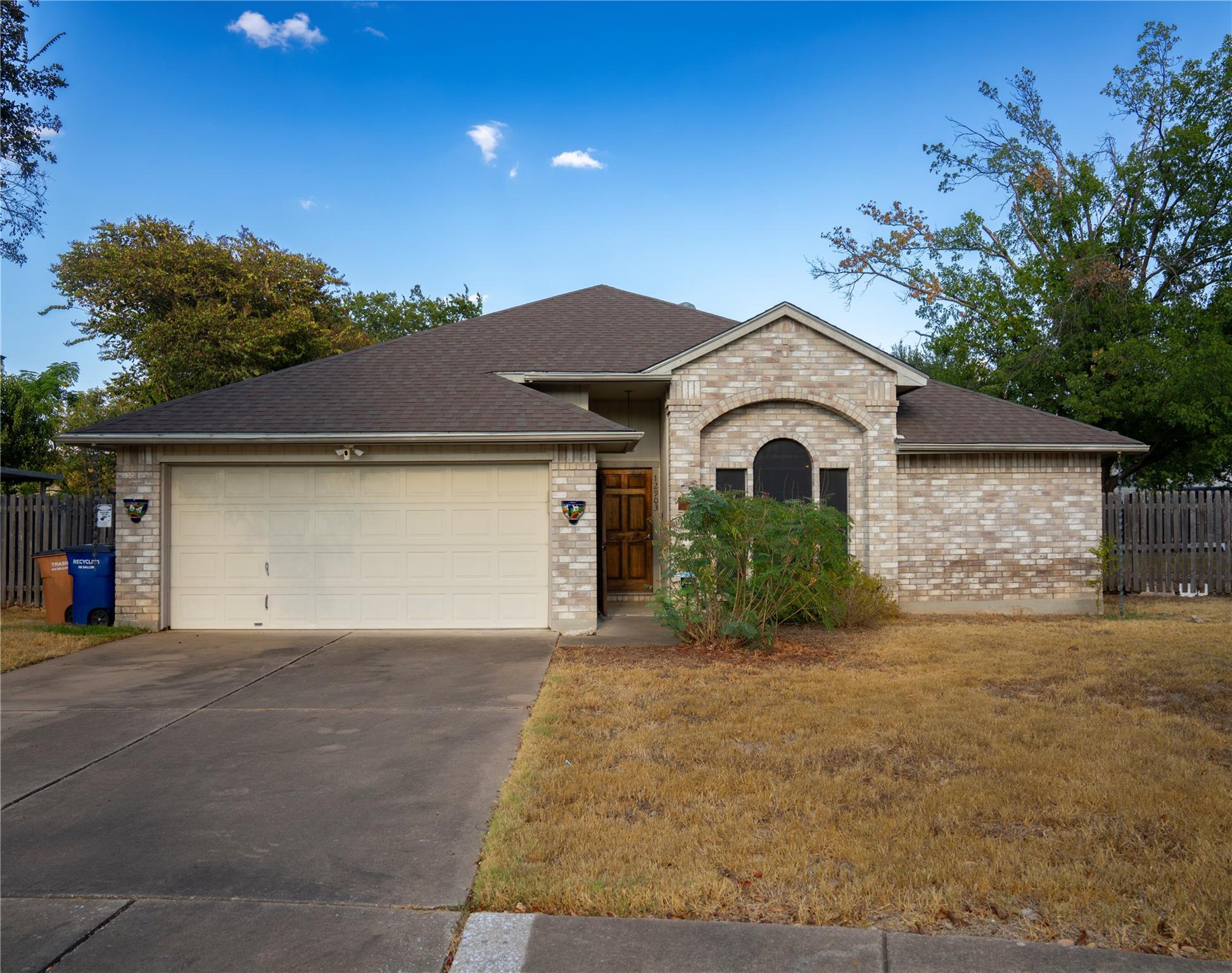 Classic brick accents and an integrated garage cr