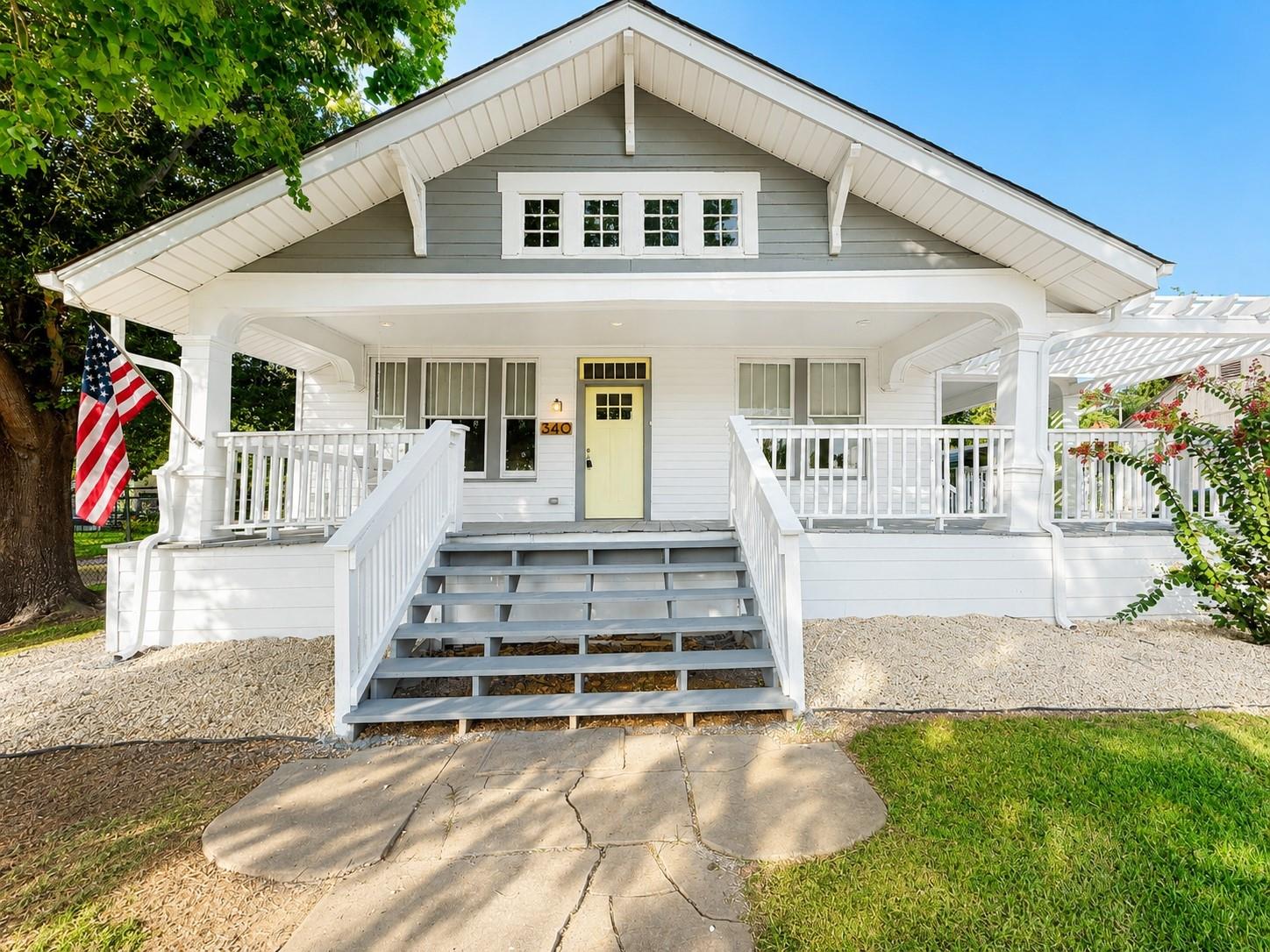 An inviting front porch welcomes visitors to this