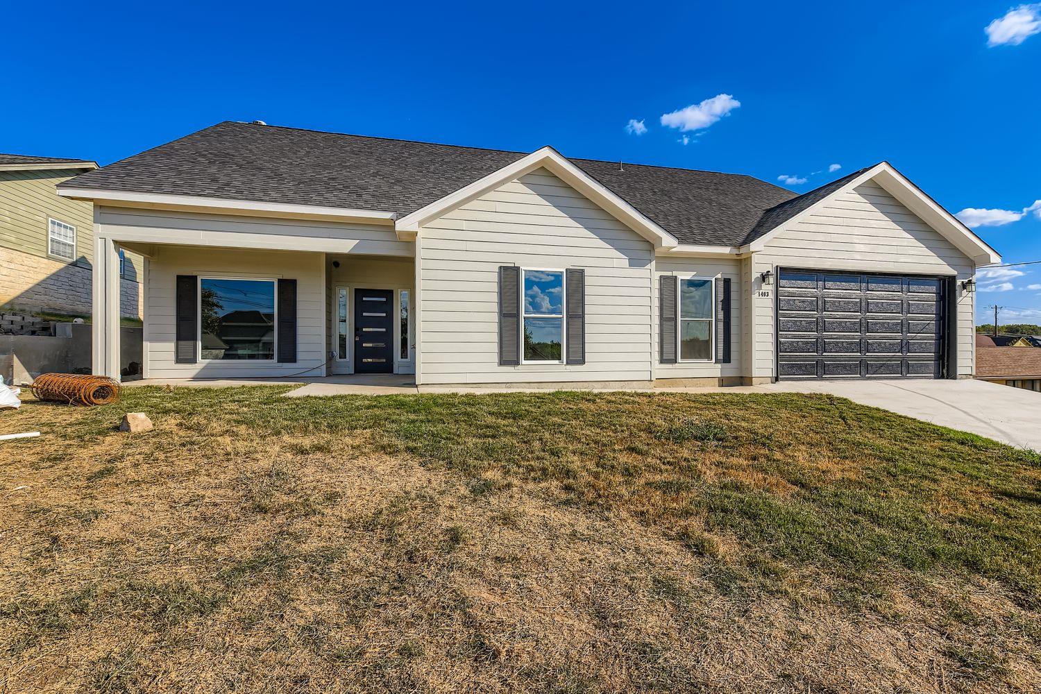 Crisp siding and a neat roofline define this clas