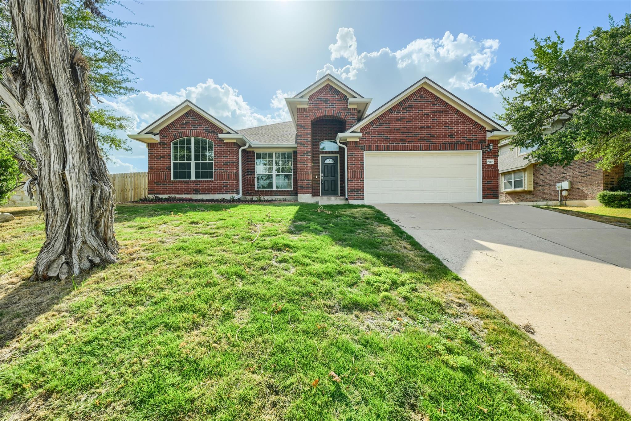 Classic brick elevation highlights this single-st