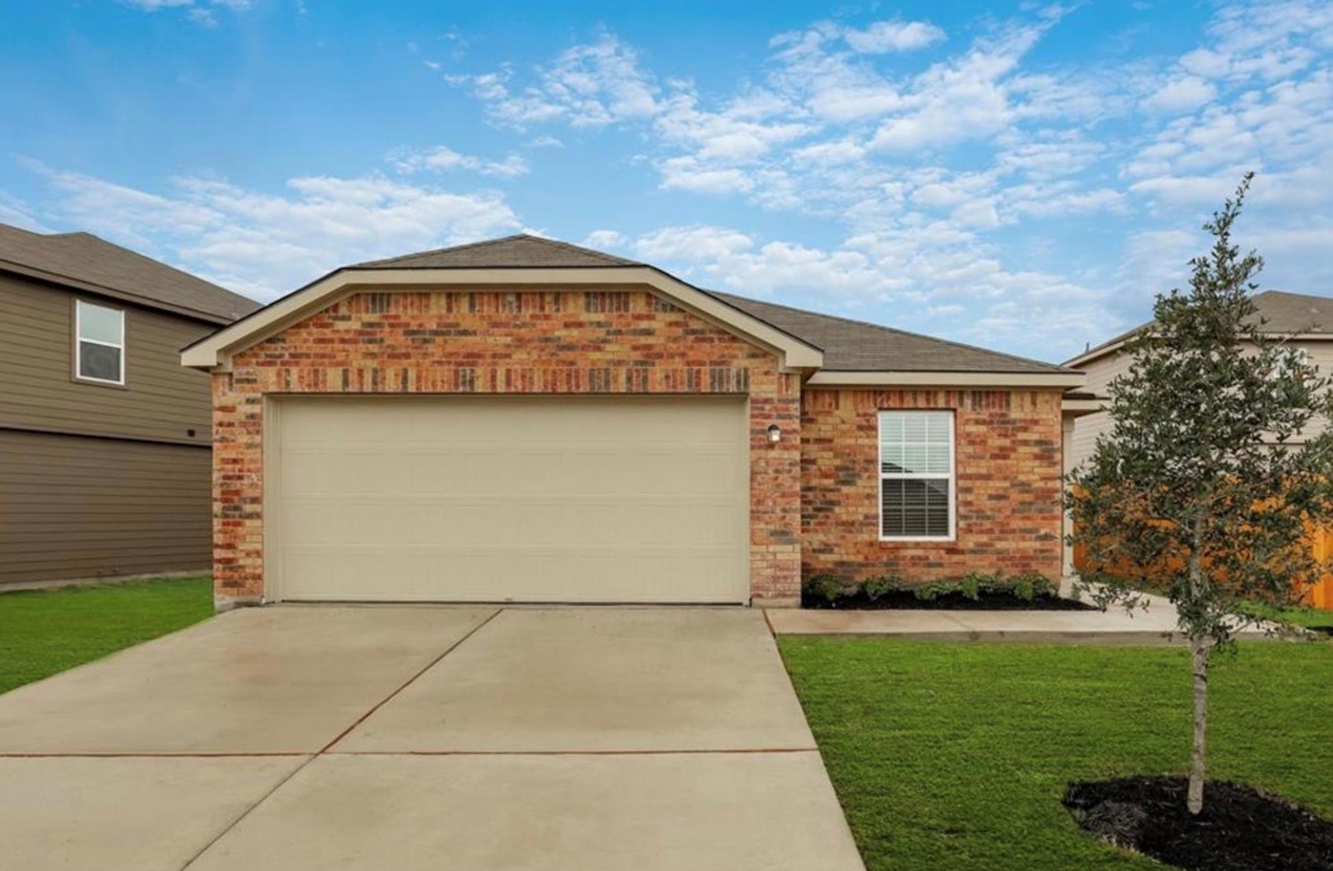 Multi-colored brick masonry defines the exterior 