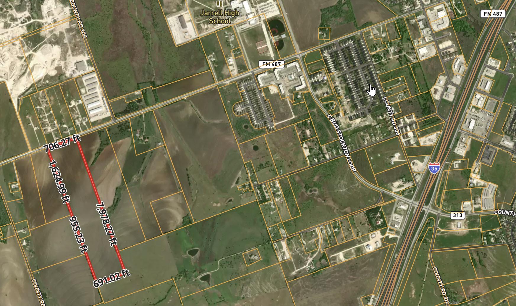 Aerial overview of property's location with prope