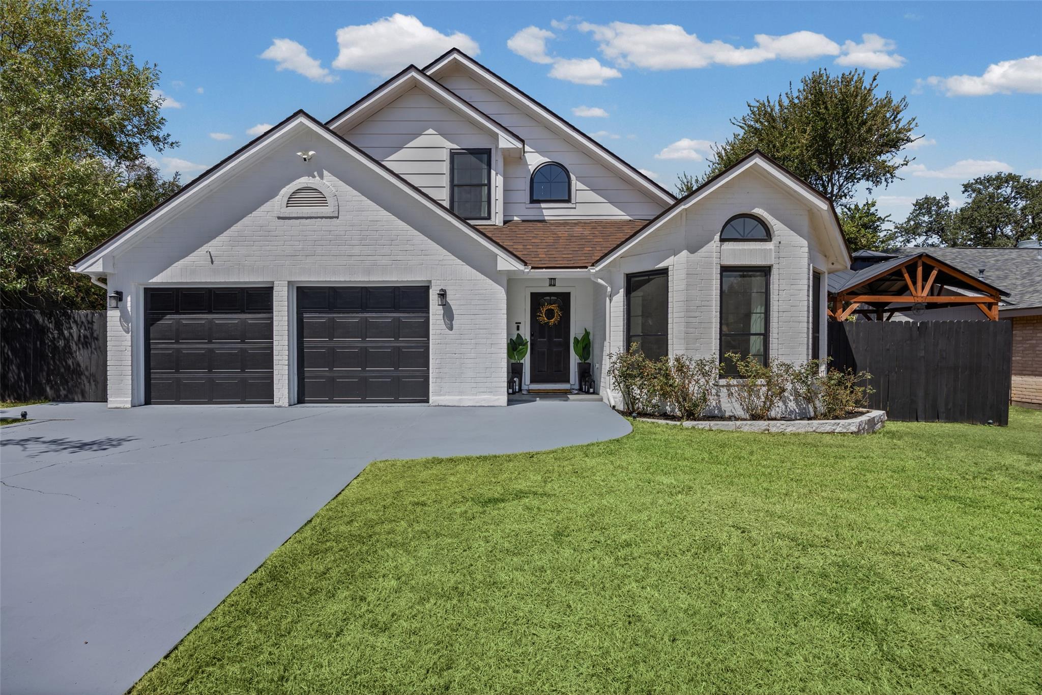 Crisp masonry siding and architectural gables def