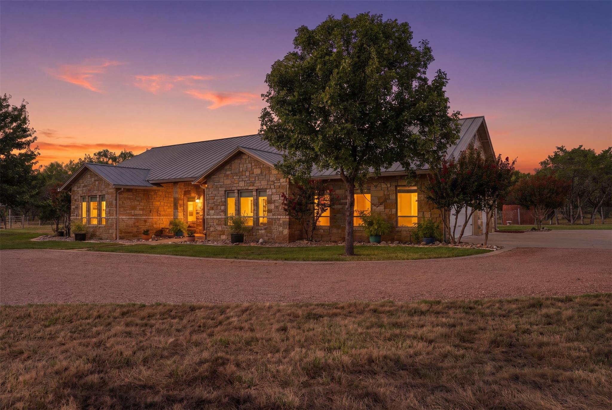A classic stone exterior and durable metal roof d
