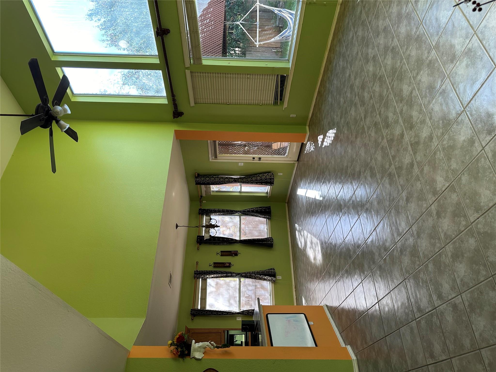 Towering ceilings and polished tile flooring defi