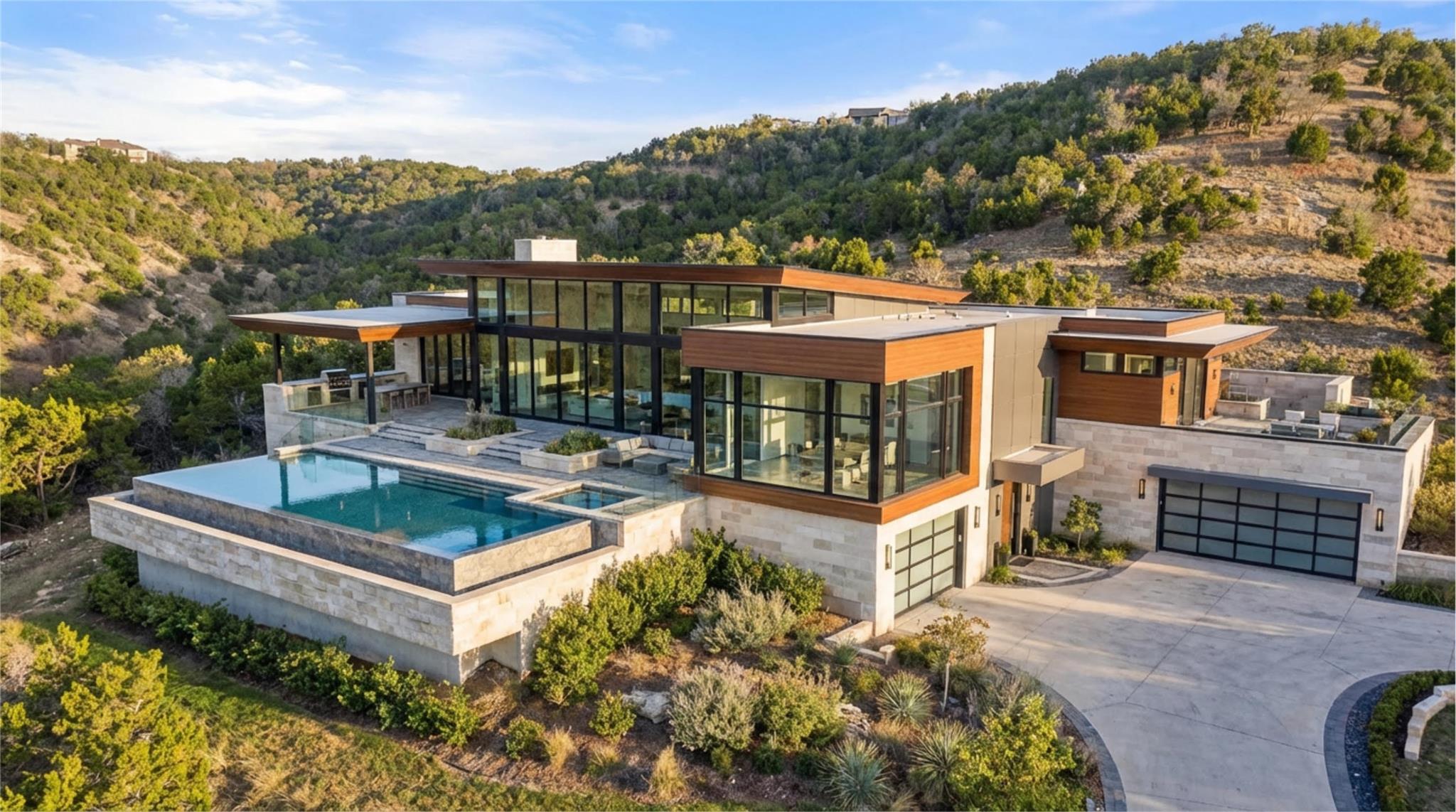 View of swimming pool featuring patio surround, a