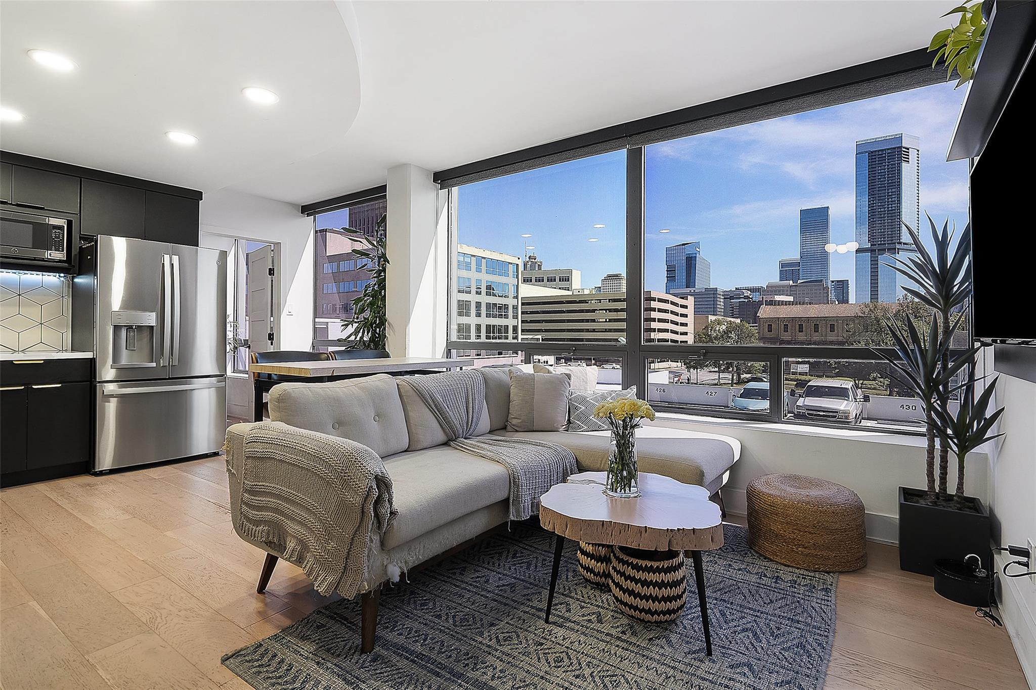 Massive floor-to-ceiling windows frame dynamic ci
